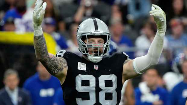 Las Vegas Raiders defensive end Maxx Crosby (98) reacts after a defensive stop against the New York Giants during the first half of an NFL football game, Sunday, Nov. 5, 2023, in Las Vegas. (AP Photo/Rick Scuteri)   